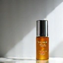 Anti-aging serum bottle with soft light